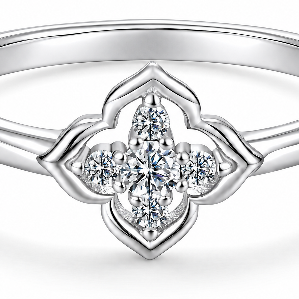 The Seren Quatrefoil Moissanite Ring in visible silver-tone finish, close studio detail of the open four-lobed setting and clear five-stone cluster on a pearl-white background, reference-based AI visualization.