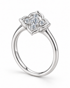 The Seren Quatrefoil Moissanite Ring in visible silver-tone finish, complete upright side-profile studio view showing setting depth on a pearl-white background, reference-based AI visualization.