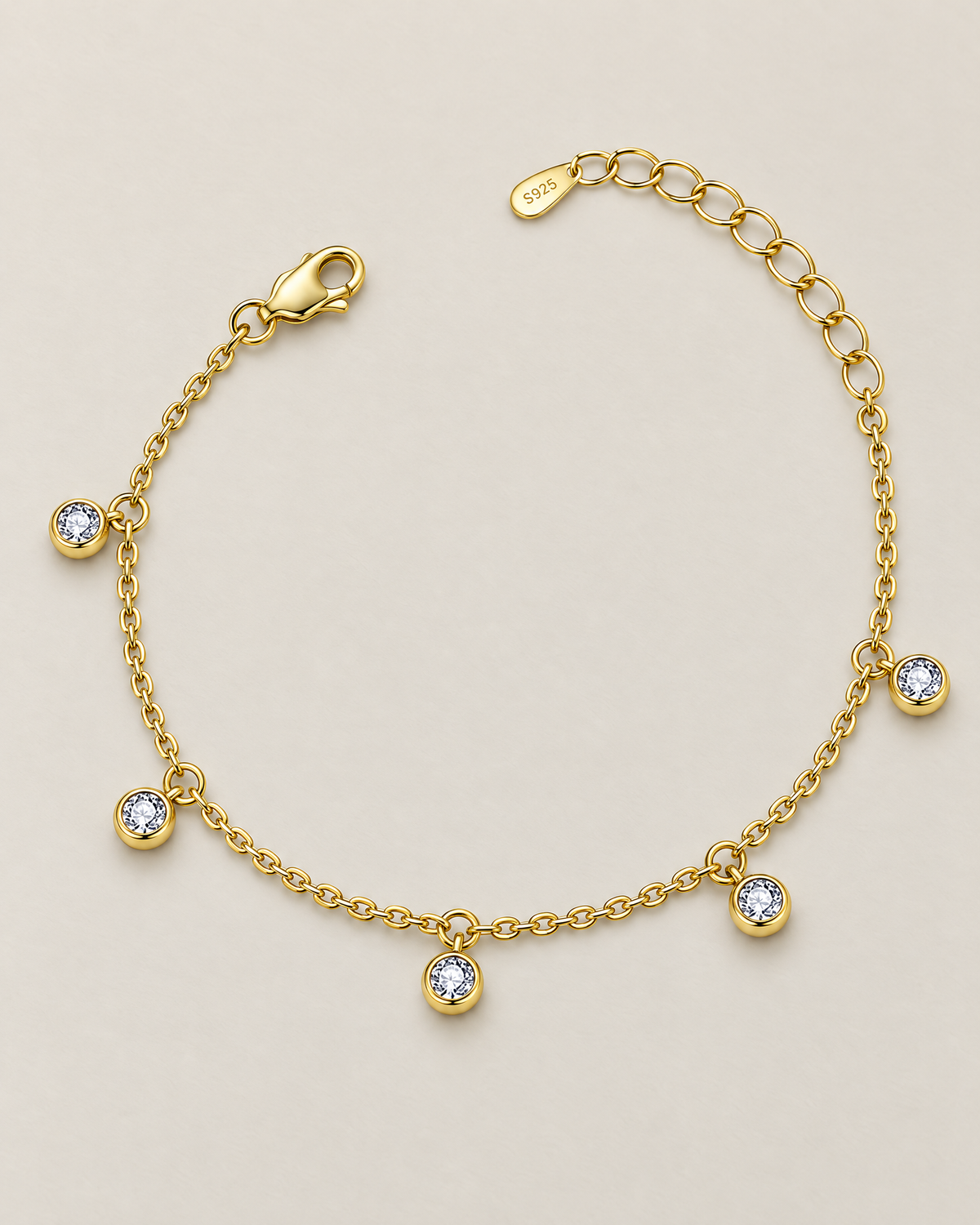 The Helle Moissanite Station Bracelet in gold tone, shown as a full five-station relaxed open curve on pale greige, reference-based AI visualization.