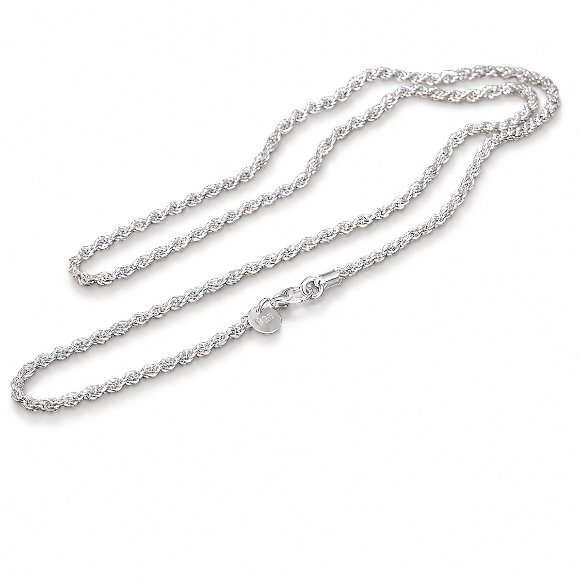 The Gala Twisted Rope Chain Necklace in polished silver, twisted rope-chain macro on pale greige, reference-based AI visualization