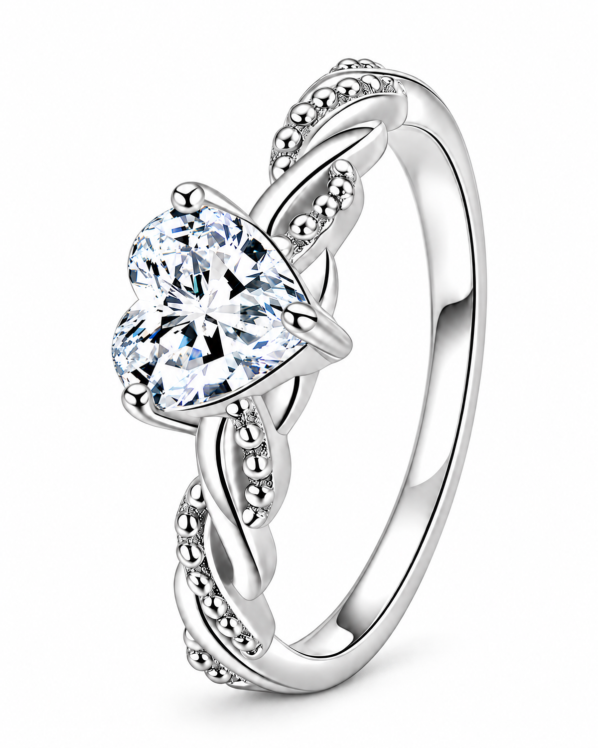 The Alva Heart-Stone Ring, observed polished silver-tone, complete front three-quarter product-only view with a clear heart-shaped center stone, four rounded prongs, and twisted beaded shoulders on a pearl-white studio background — reference-based AI visualization.