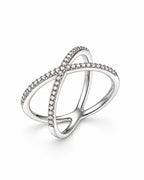 The Elsen Geometric Ring in a polished silver-tone finish with clear round stones, upright front three-quarter product-only view on a pearl-white studio background, reference-based AI visualization