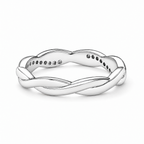 The Veda CZ Twisted Band — polished silver twisted rail and clear round CZ bead/prong macro detail on pearl-white studio background; reference-based AI visualization.