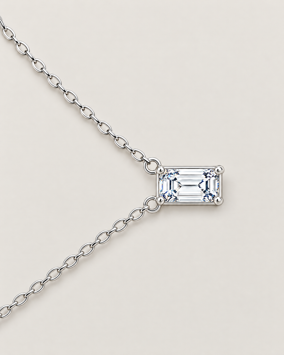 The Mara Geometric CZ Pendant — jewelry-only lateral layout with the horizontal clear rectangular stone, four corner prongs, side rings, and alternating-link chain on pale warm greige; reference-based AI visualization