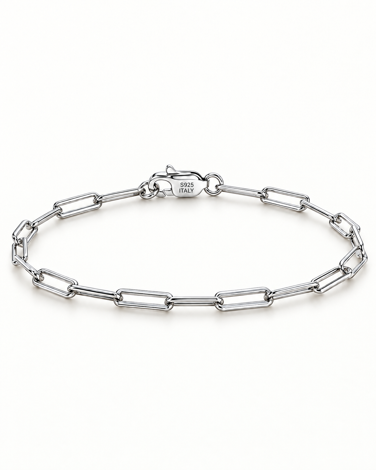 The Aelin Paperclip Bracelet in silver tone, full oval hero on a plain pearl-white studio background; reference-based AI visualization