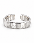 The Lena Hammered Open Band Ring — polished silver-tone front three-quarter product-only hero on a pearl-white studio background, reference-based AI visualization.