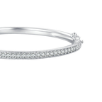 The Maia Pavé Hinge Bangle polished silver-tone hinge and clear-stone pavé clasp-side detail on pale greige, reference-based AI visualization