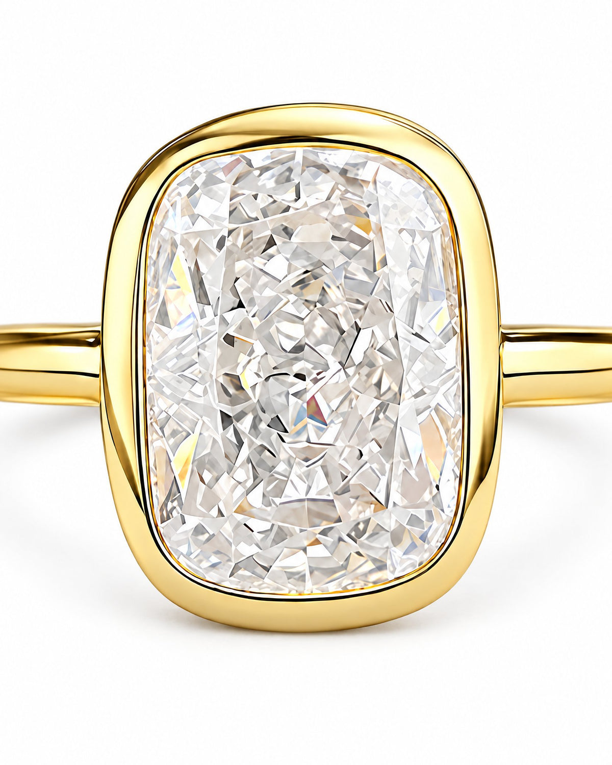 The Tilde Bezel Ring in polished yellow-gold tone with one clear faceted rounded-rectangle stone in a front setting macro on pearl-white — reference-based AI visualization