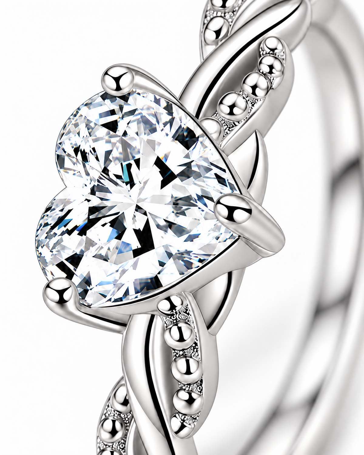The Alva Heart-Stone Ring, observed polished silver-tone, macro detail of the clear heart-shaped center stone, four rounded prongs, and twisted beaded shoulder on a pearl-white studio background — reference-based AI visualization.