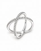 The Elsen Geometric Ring in a polished silver-tone finish with clear round stones, high-angle diagonal resting product-only view on a pearl-white studio background, reference-based AI visualization