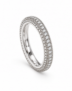 The Klint CZ Pavé Band — polished silver-tone upright front three-quarter full-ring studio view on pearl white; reference-based AI visualization.