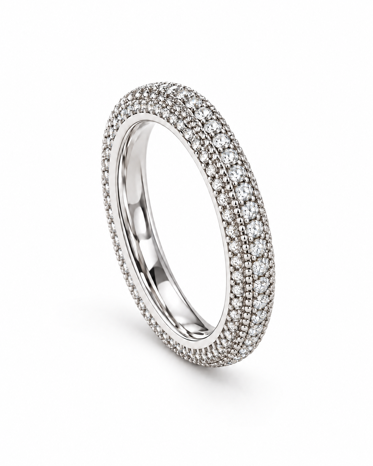 The Klint CZ Pavé Band — polished silver-tone upright front three-quarter full-ring studio view on pearl white; reference-based AI visualization.
