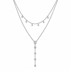 The Lyra CZ Y-Drop Lariat — Silver full flat-lay close view, white studio treatment; reference-based AI visualization