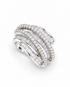 The Iona Interwoven Ring — White/silver-tone finish, high-angle face-up diagonal resting view on a pearl-white studio background; reference-based AI visualization.