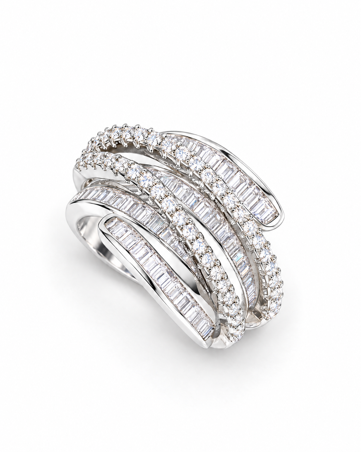 The Iona Interwoven Ring — White/silver-tone finish, high-angle face-up diagonal resting view on a pearl-white studio background; reference-based AI visualization.