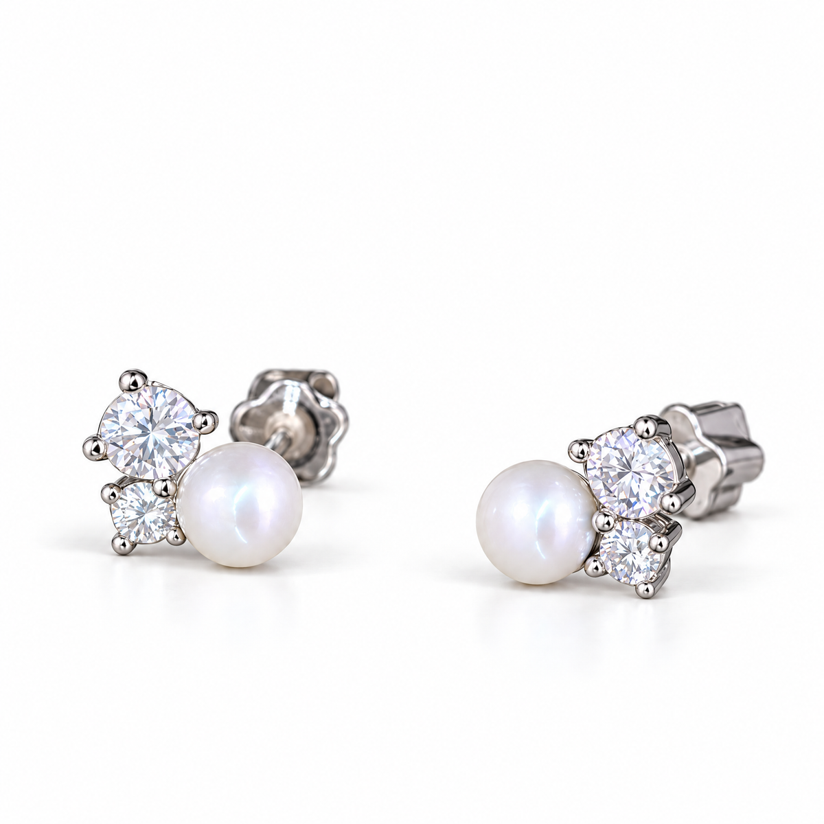 The Elva Pearl & Moissanite Stud Earrings, matching silvery studs with luminous white pearls and two clear round stones per earring in a front three-quarter pair composition on pale greige, reference-based AI visualization.