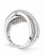 The Iona Interwoven Ring — White/silver-tone finish, reverse-side setting and construction profile on a pearl-white studio background; reference-based AI visualization.