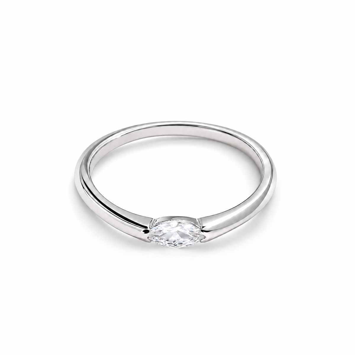 The Aure Marquise-Cut CZ Ring, polished silver front three-quarter product-only hero on a pearl-white studio background — reference-based AI visualization.