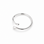 The Nova Open Geometric Band — polished silver-tone open bypass ring worn on a deep-brown-skinned adult hand with ivory linen and warm window light; reference-based AI visualization.