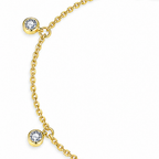 The Helle Moissanite Station Bracelet in gold tone, shown in an overhead detail with two round bezel stations and fine chain on pale greige, reference-based AI visualization.