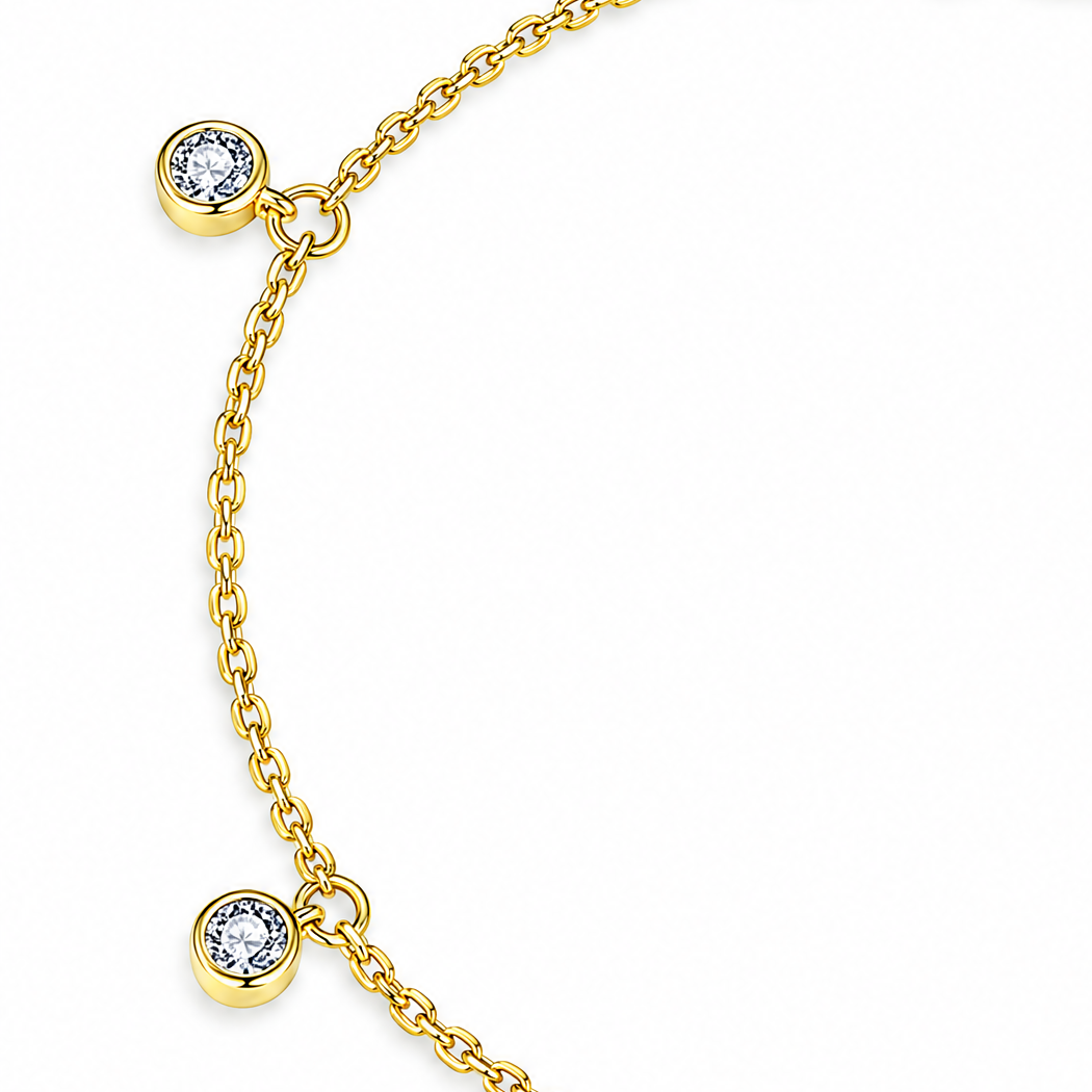 The Helle Moissanite Station Bracelet in gold tone, shown in an overhead detail with two round bezel stations and fine chain on pale greige, reference-based AI visualization.