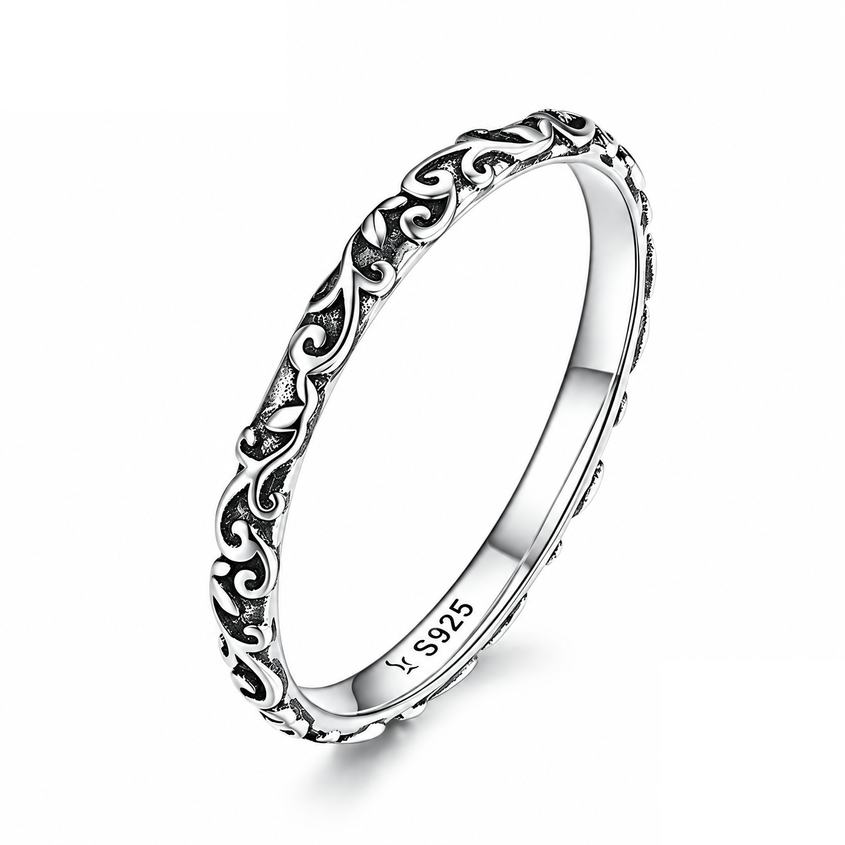 The Svea Engraved Vine Band in silver-tone finish, complete front three-quarter view with raised darkened vine scrollwork — reference-based AI visualization.