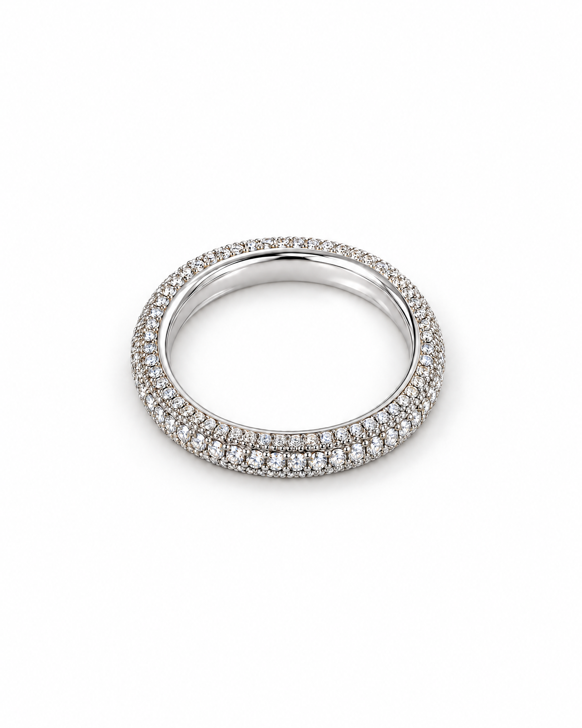 The Klint CZ Pavé Band — polished silver-tone overhead face-up full-ring studio view on pearl white; reference-based AI visualization.