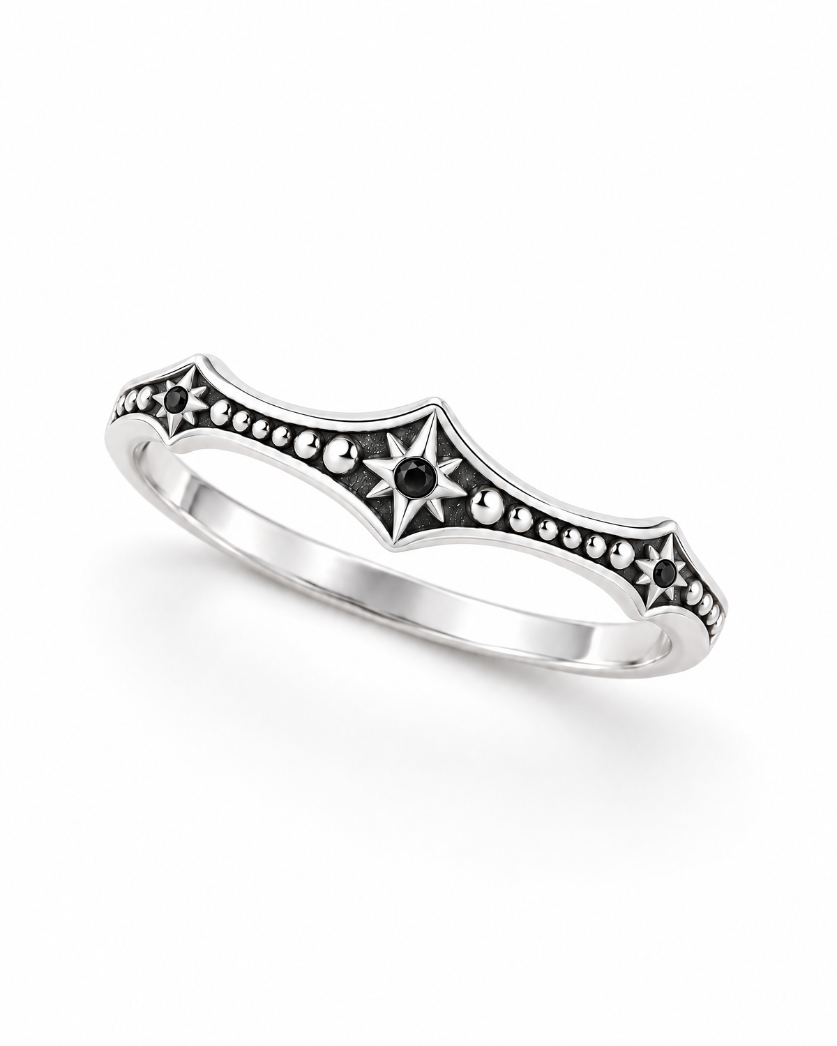 The Runa Starburst Ring — bright silver-tone finish, complete overhead diagonal view on a pearl-white studio background; reference-based AI visualization.