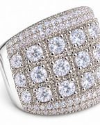 The Solis CZ Dome Ring — silver-color clear-stone and pavé setting macro on a pearl-white studio background, reference-based AI visualization.