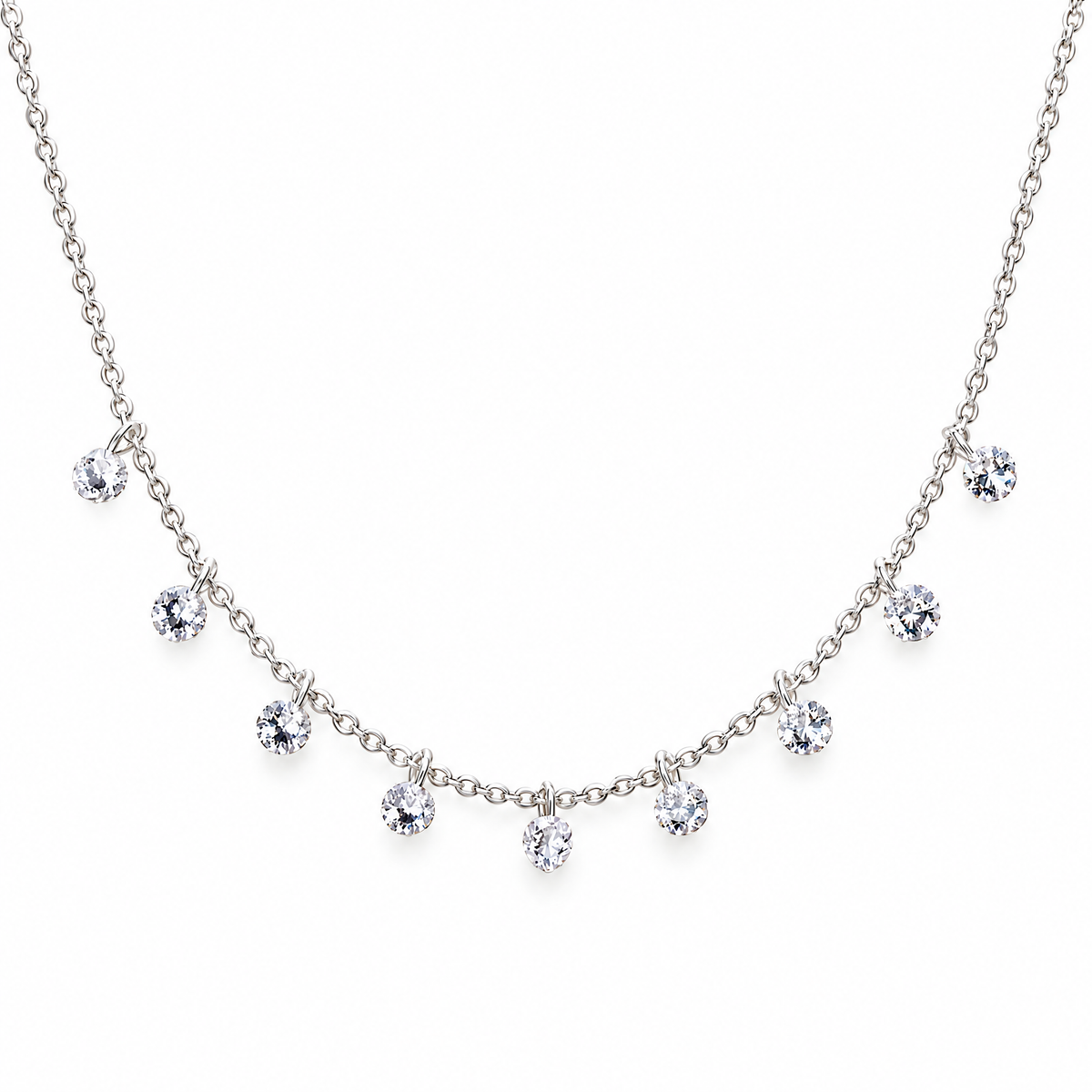 The Astrid CZ Link Necklace — silver-tone CZ charm necklace, front detail in white studio; reference-based AI visualization.