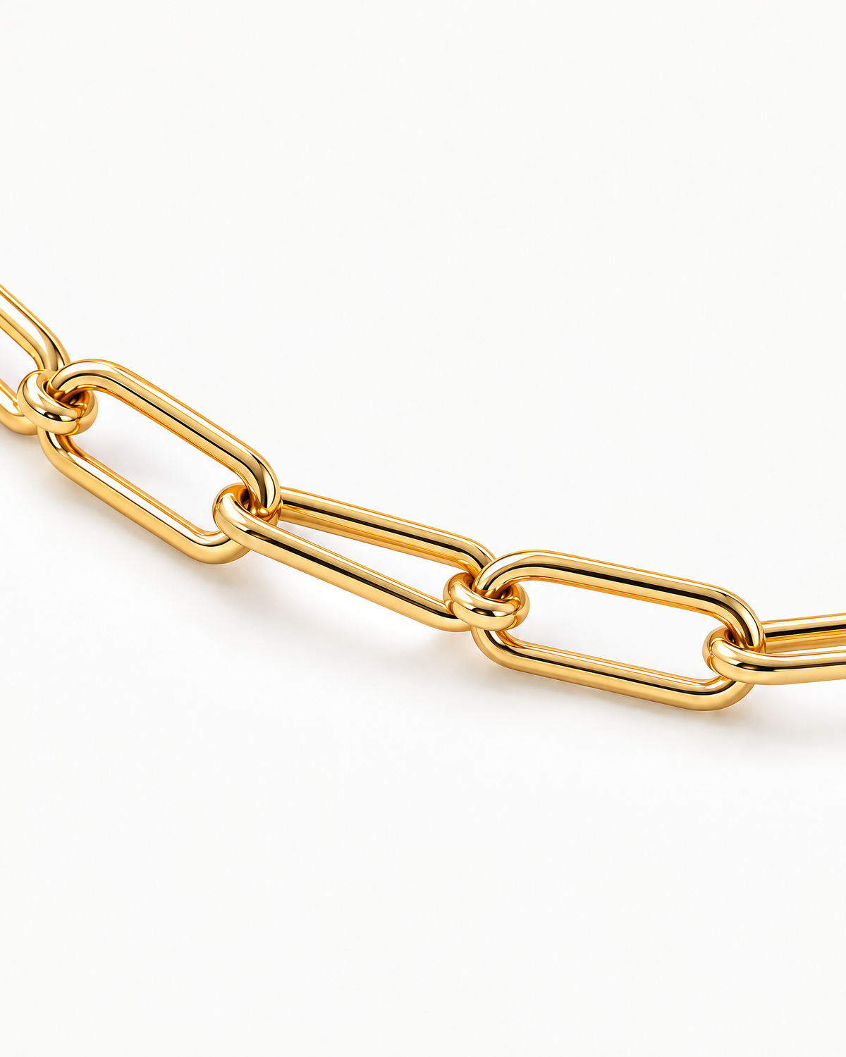 The Linnea Link Bracelet — polished gold-color open paperclip-link detail on pale greige — reference-based AI visualization