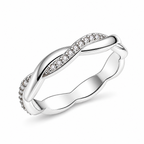 The Veda CZ Twisted Band — polished silver twisted band with clear round CZ accents, oblique full-ring setting-profile on pearl-white studio background; reference-based AI visualization.