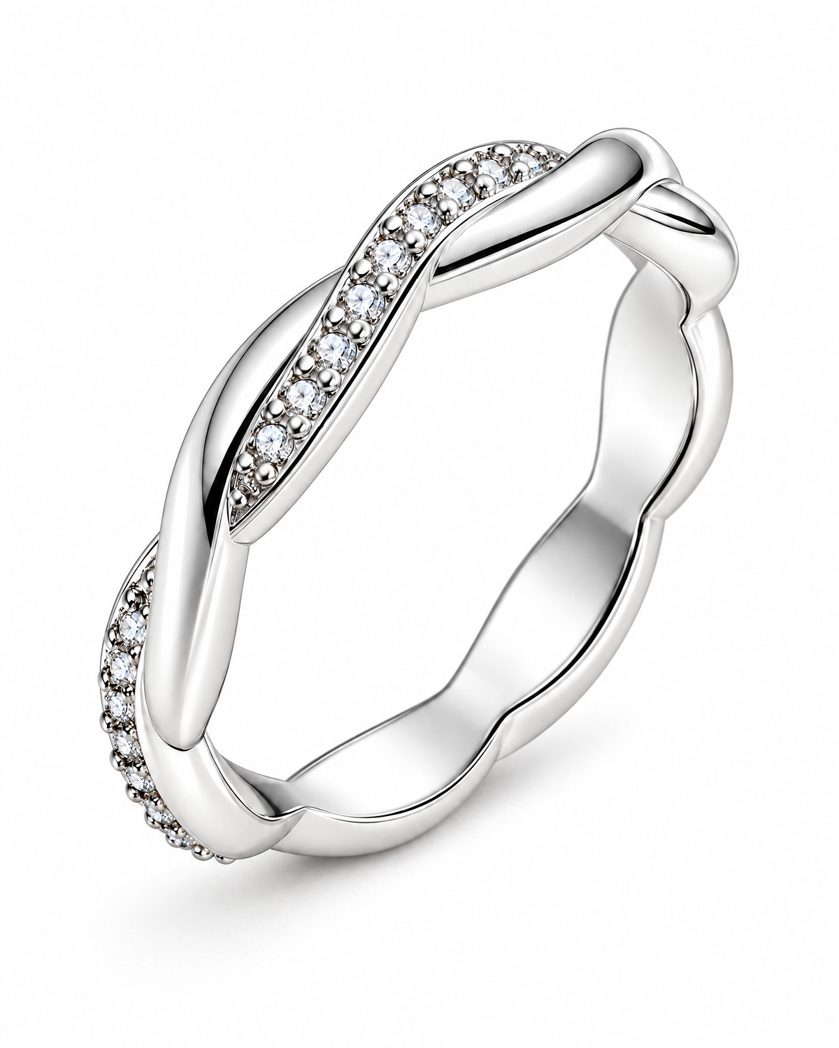 The Veda CZ Twisted Band — polished silver twisted band with clear round CZ accents, oblique full-ring setting-profile on pearl-white studio background; reference-based AI visualization.